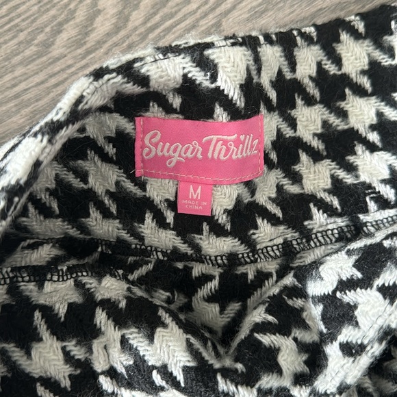 NWOT Sugar Thrillz by Dolls Kill pleated houndstooth mini skirt with buckles - Picture 2 of 6